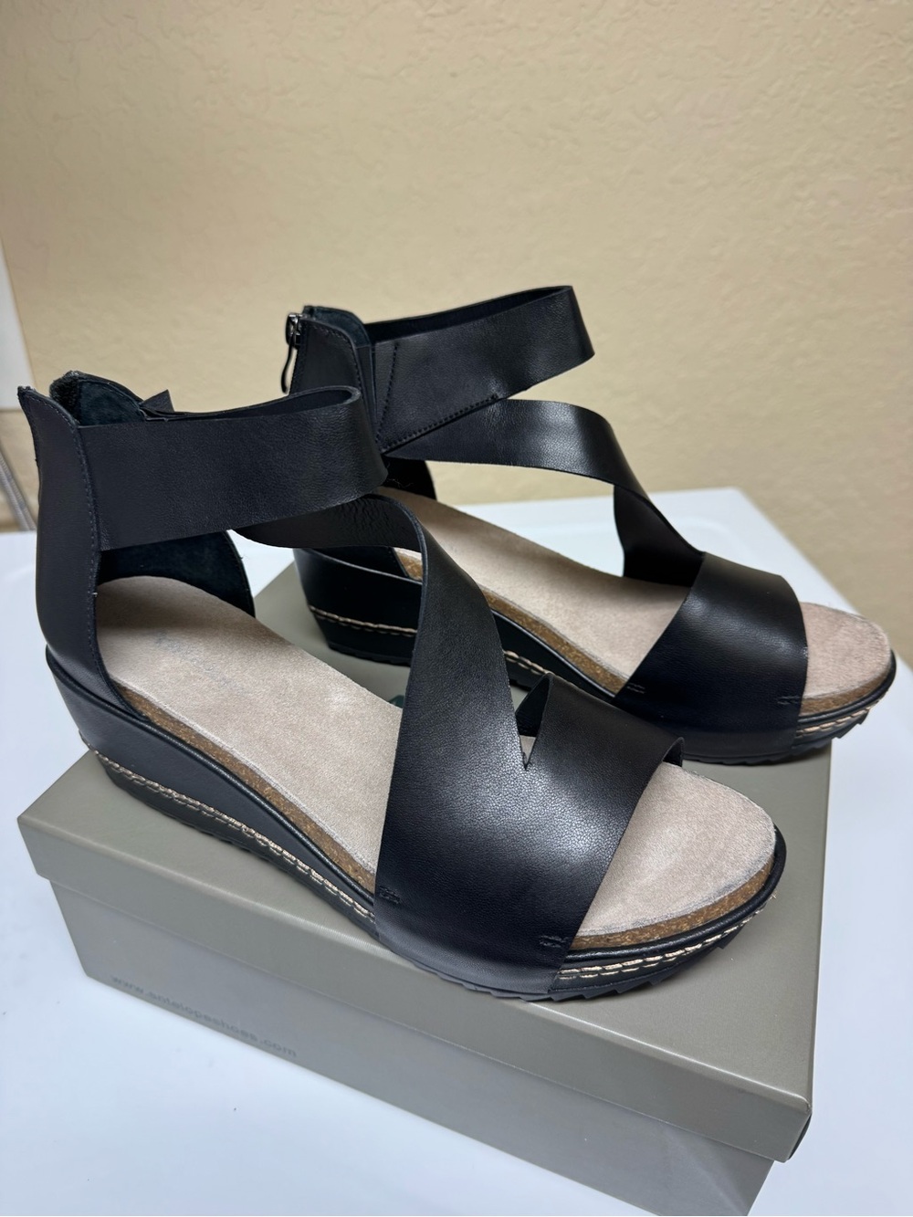 Antelope Black Leather Crisscross Wedge Sandals